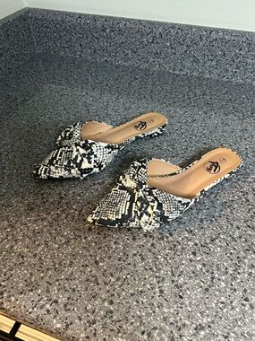 Trary Pointed Slide Mules in Black & White Snake Print
